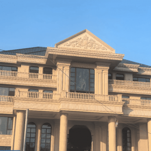 宁夏黄金麻别墅外墙干挂石材效果示例