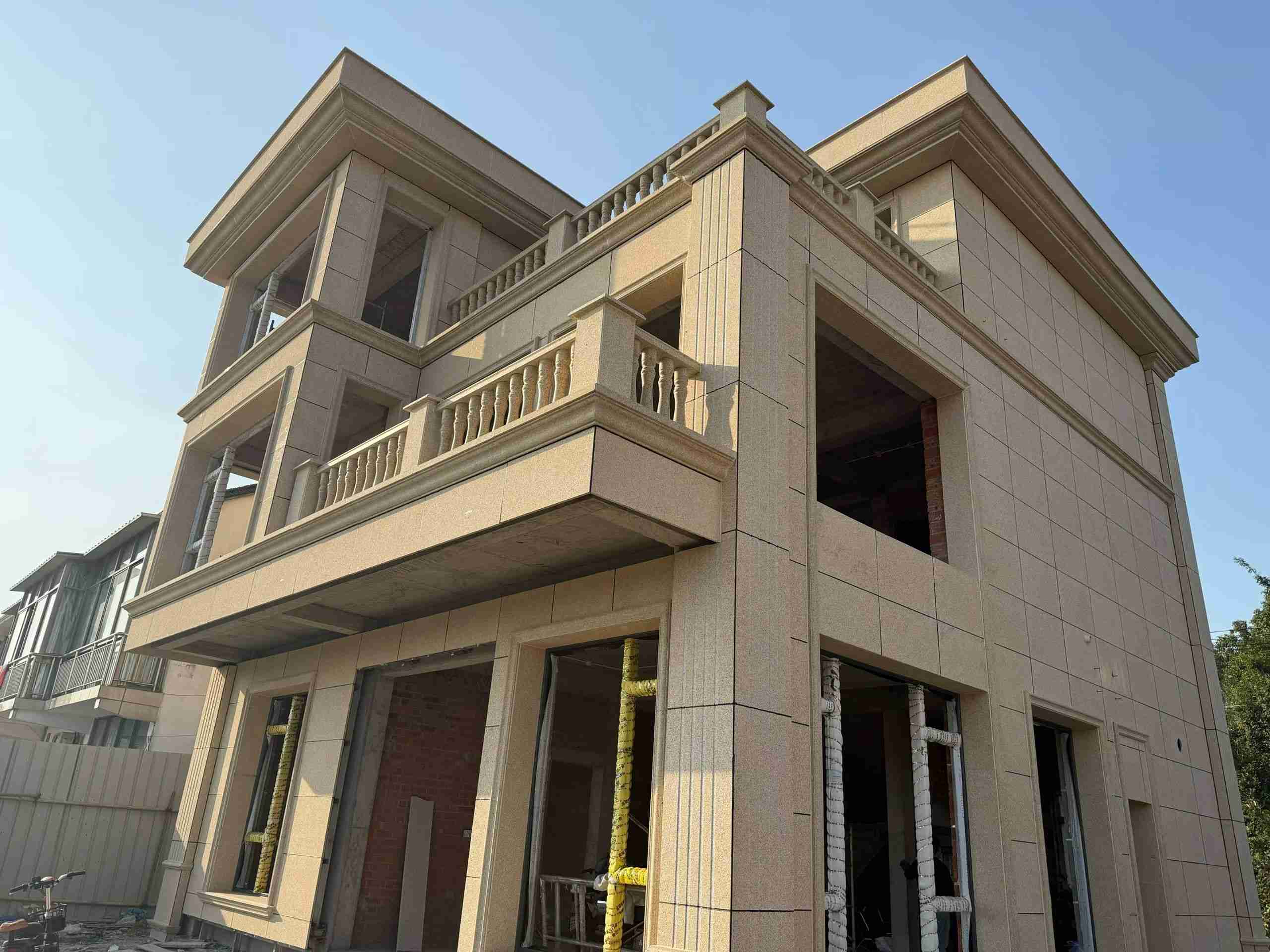 宁夏 黄金麻花岗岩石材荔枝面外墙干挂效果展示